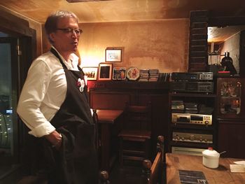 Man standing in restaurant