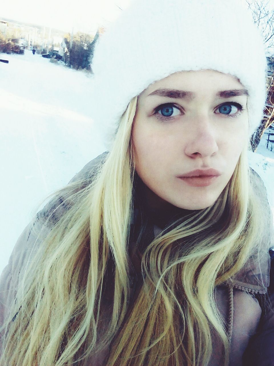 winter, cold temperature, snow, portrait, weather, looking at camera, beautiful woman, long hair, warm clothing, one person, outdoors, day, young adult, young women, nature, real people, blond hair, close-up, people