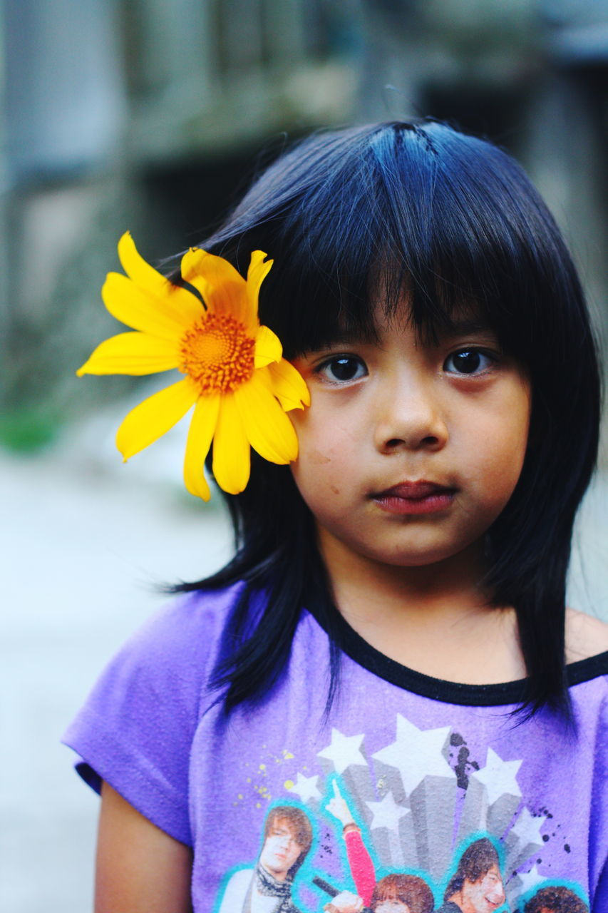 CLOSE-UP PORTRAIT OF A GIRL