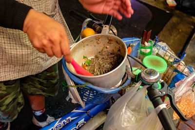 High angle view of man holding food