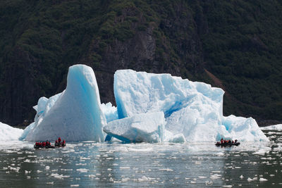 Scenic view of icebergs in sea