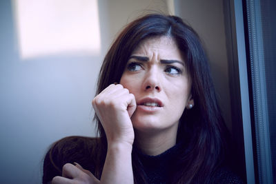 Portrait of beautiful woman at home