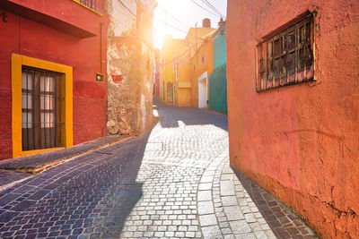 Alley amidst buildings in city