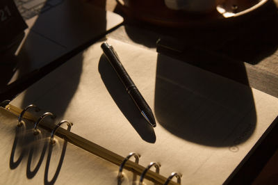 High angle view of book on table