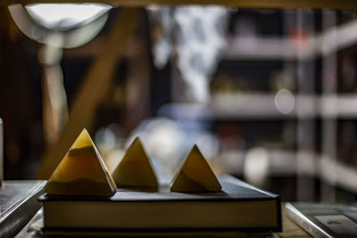 Close-up of illuminated lighting equipment on table