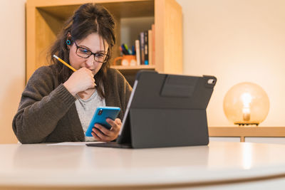 White woman working from home