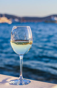 Close-up of wineglass on table