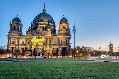 The lustgarten with the cathedral and the famous tv tower in the back before sunrise, seen in berlin