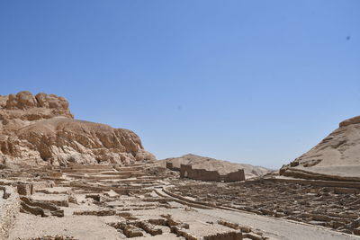 Rock formations against blue sky