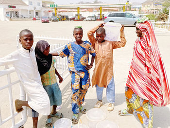 Group of african kids standing against the wall