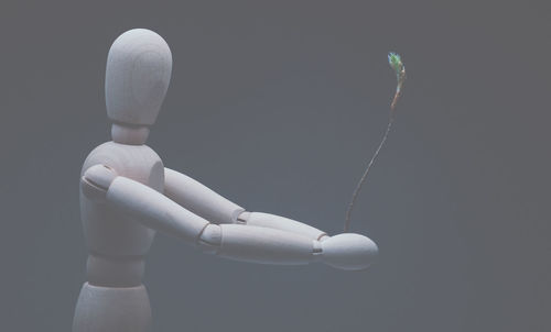 Close-up of hand holding umbrella