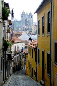 Buildings in city against sky