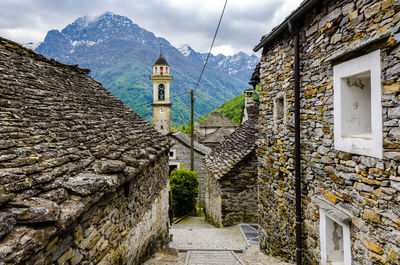 View of town against cloudy sky