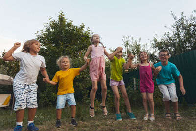 People standing against sky