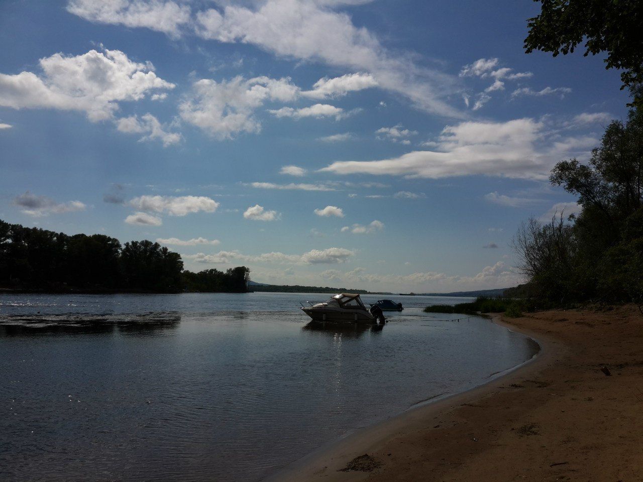 water, sky, tranquil scene, tranquility, nautical vessel, scenics, tree, boat, beauty in nature, sea, nature, beach, transportation, cloud - sky, cloud, shore, lake, mode of transport, idyllic, sand