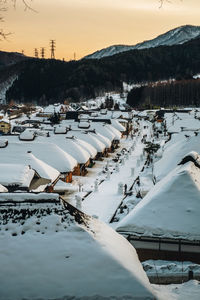 Scenic view of snow covered mountains against sky