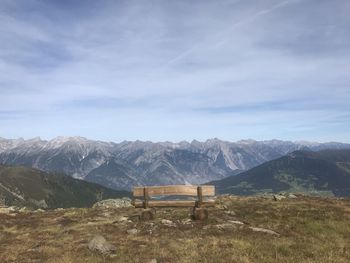 Scenic view of snowcapped mountains against sky