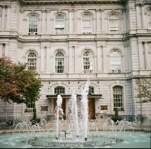 Buildings reflecting in water