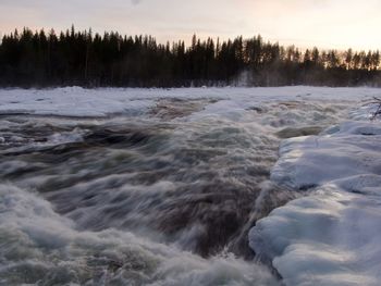 Winter landscape, waterfall storforsen in the north of sweden