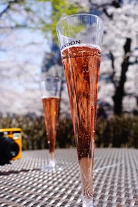 Close-up of beer glass on table