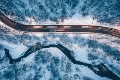 High angle view of snow covered water