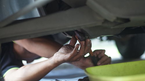 Close-up of man preparing food