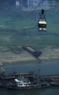 View of overhead cable car over river