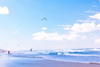 Scenic view of sea against cloudy sky