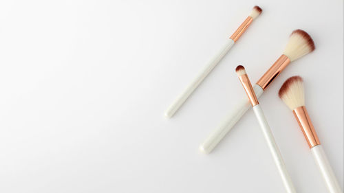 High angle view of cigarettes on white background