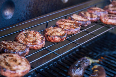 High angle view of meat on barbecue grill