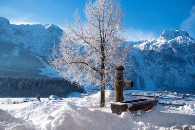 Scenic view of snowcapped mountains against sky