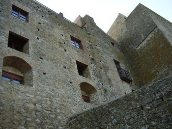 Low angle view of historic building against sky