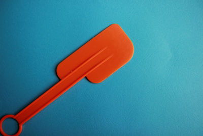 High angle view of red table against blue wall
