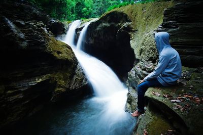 Scenic view of waterfall in forest