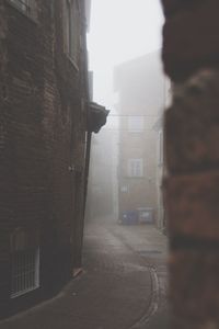 Buildings in city against sky