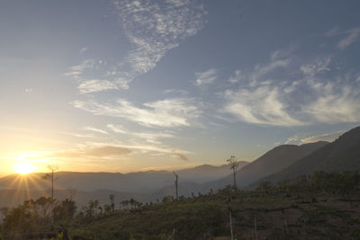 Scenic view of landscape against sky during sunset