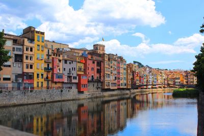 View of canal with buildings in background