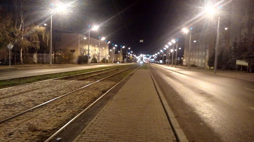 Surface level of railroad tracks at night