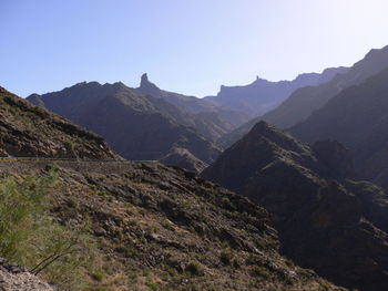 Scenic view of mountains against clear sky