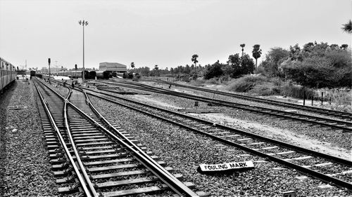 Railroad station platform against clear sky