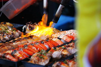 Close-up of meat on barbecue grill