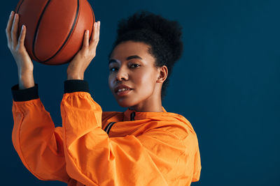 Young man playing basketball