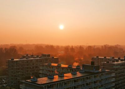 View of cityscape at sunset