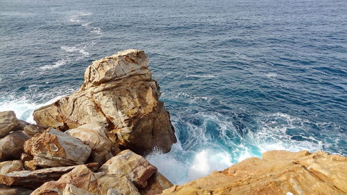 High angle view of rocks on beach