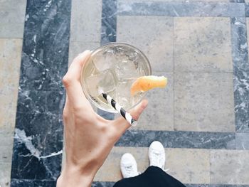 Close-up of hand holding glass