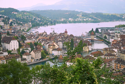 High angle view of townscape by river