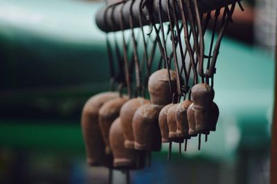 Close-up of hand hanging outdoors