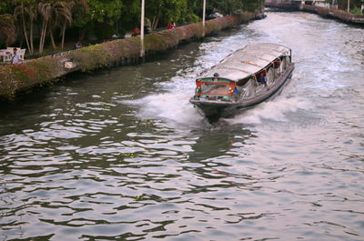 High angle view of boat sailing in river