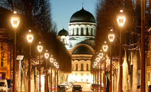 Illuminated buildings in city at night