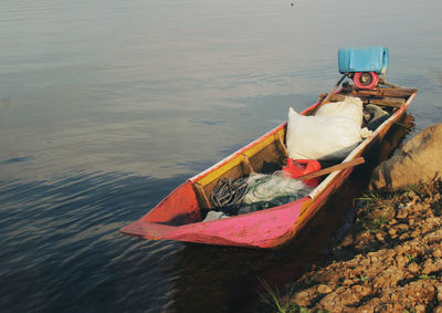 High angle view of boat moored at lake